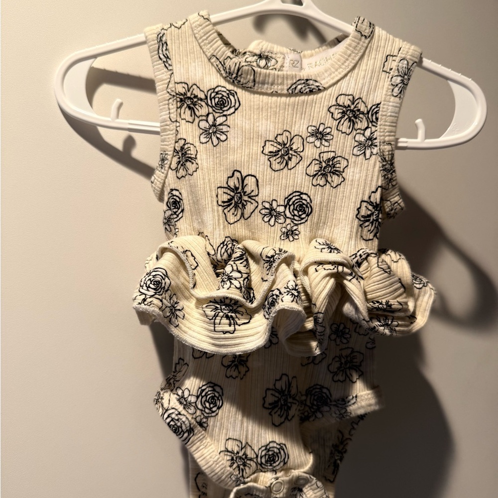 Rachel Zoe Cream and Black Floral Baby Onesie